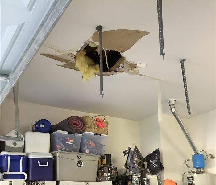 Water damage in garage ceiling 