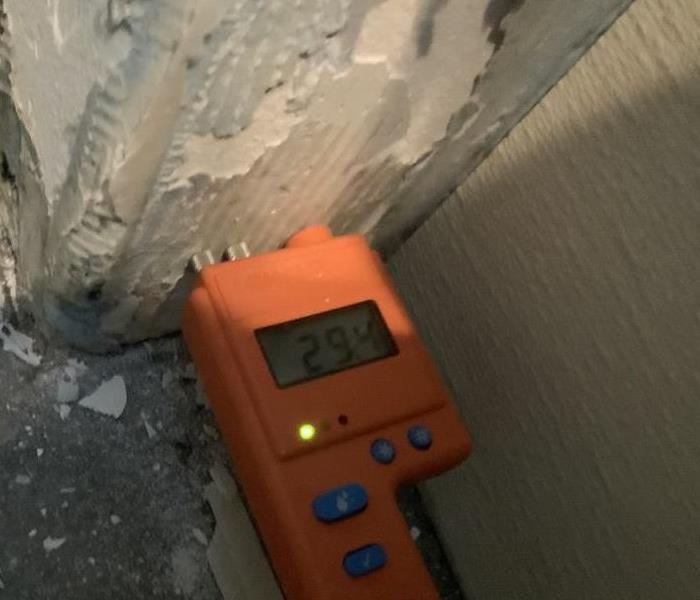 Using a penetrating meter to detect water in drywall