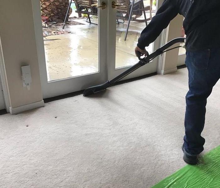 Water extraction from carpet flooring