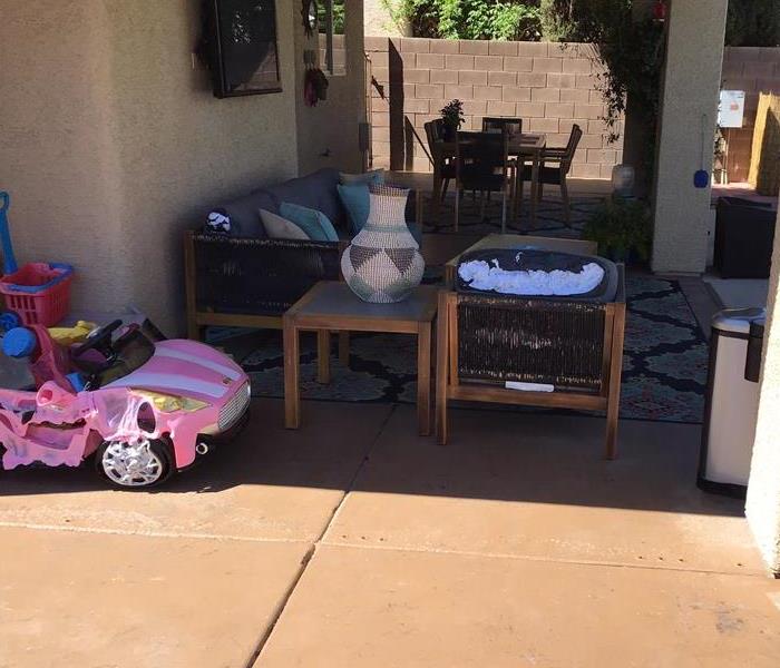 Melted toy car and furniture