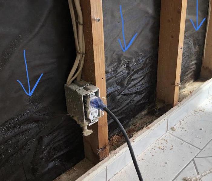 Trapped water discovery behind insulation
