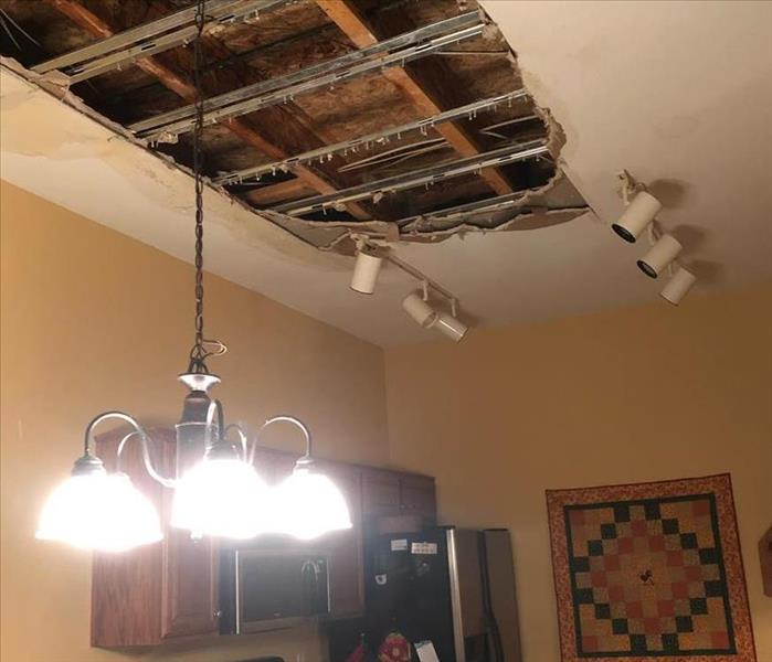 Ceiling drywall damage from plumbing leak