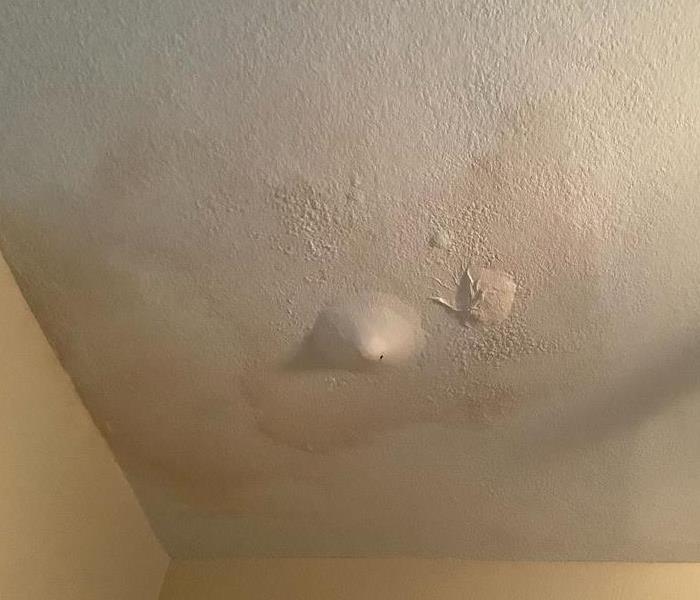 Ceiling damage from rain storm